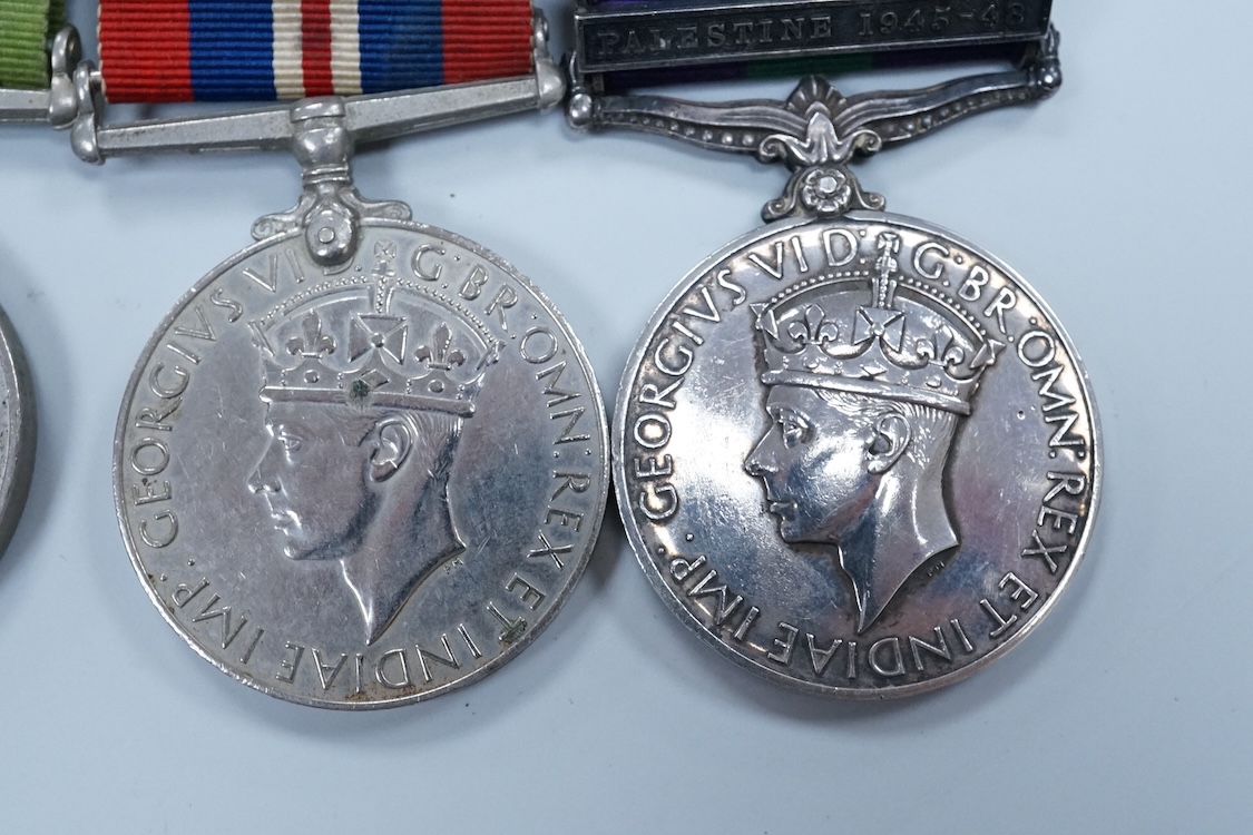 A WWII medal group awarded to Fg. Off. A.J. Fransella R.A.F., comprising of five medals including the Defence Medal, the 1939-1945 Medal, the Italy Star, the 1939-1945 Star and the General Service Medal with clasp for Pa